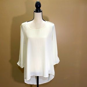 Harve’ Benard cream top with peekaboo back